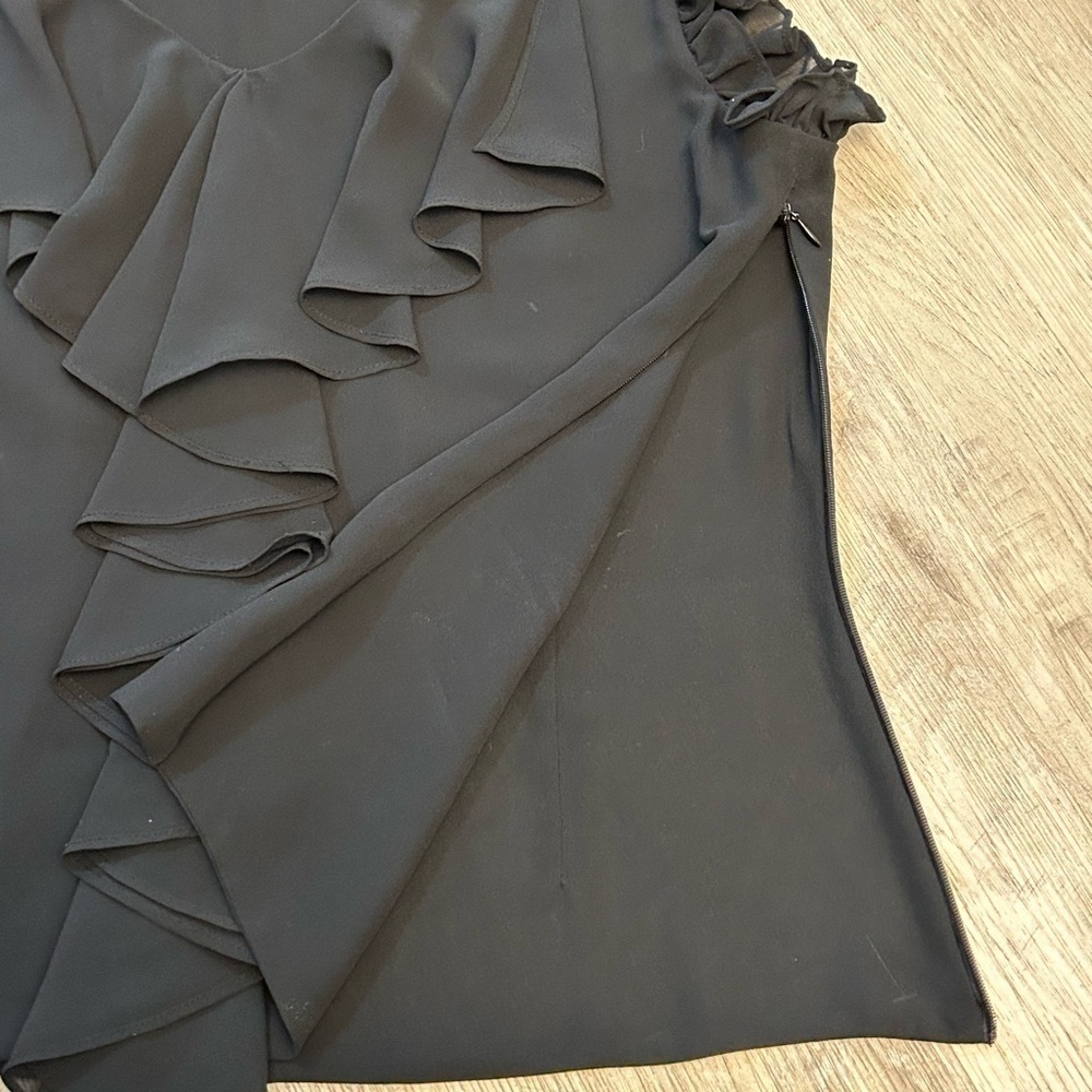 J.MICHAELS black sleeveless ruffle top in new condition. Pit to pit-19”. - Picture 7 of 10